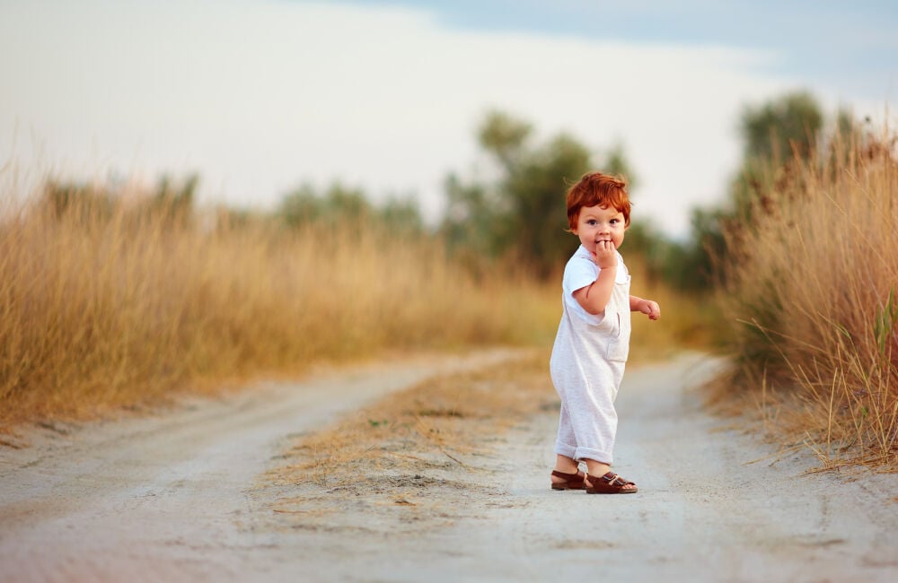 A baby wearing good walking shoes for a baby A baby wearing good walking shoes for a baby