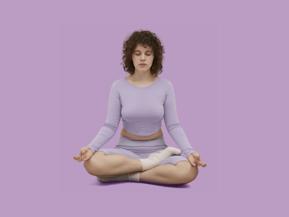 A woman meditating A woman meditating