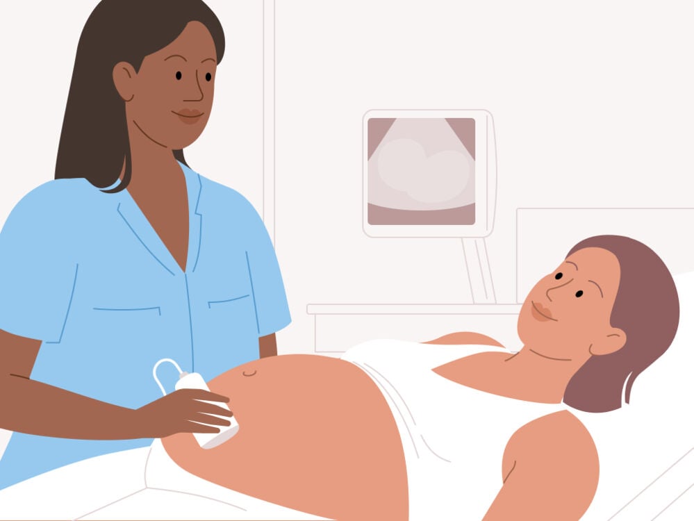 Pregnant woman having an ultrasound scan to find out her babies sex Pregnant woman having an ultrasound scan to find out her babies sex