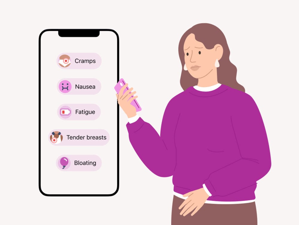 A woman looking at different symptoms at 3 DPO on her phone symptoms at 3 DPO