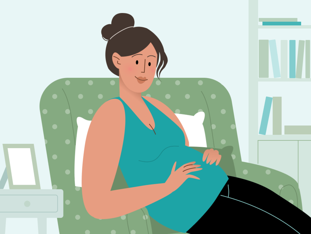 Pregnant woman holding bump Pregnant woman holding bump