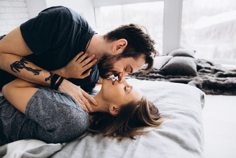 A couple kissing during sex A couple kissing during sex