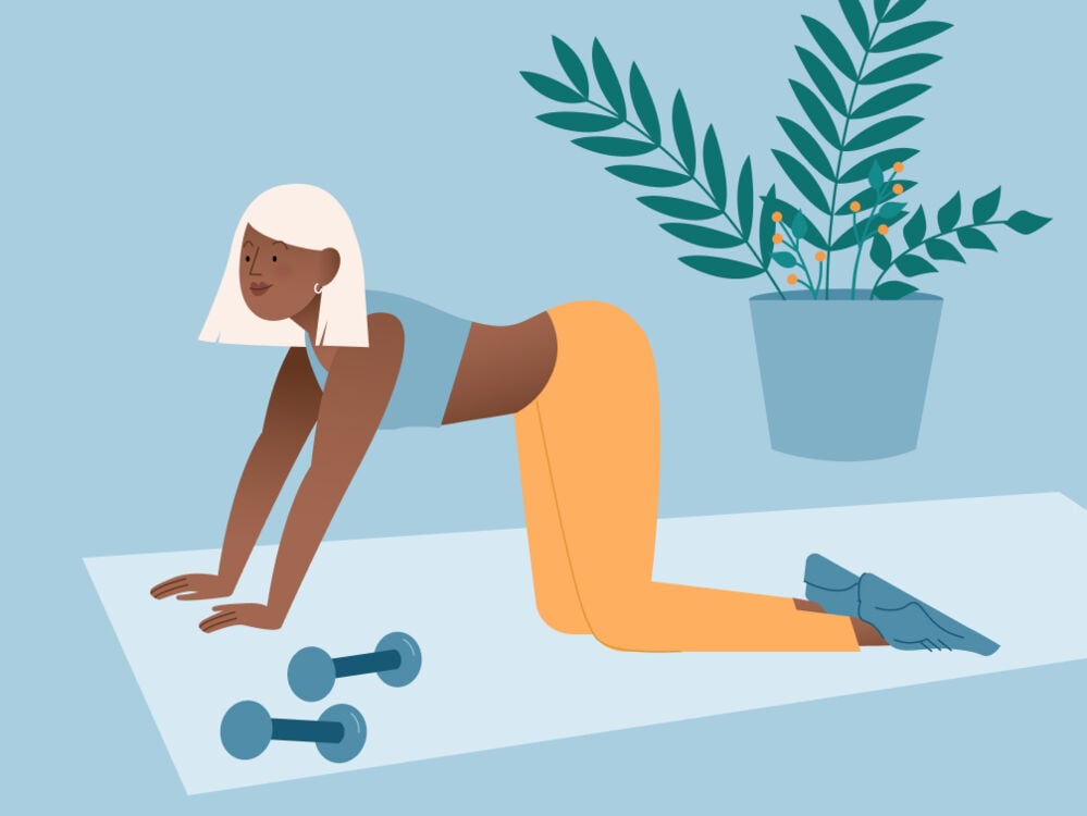 woman exercising on a mat woman exercising on a mat