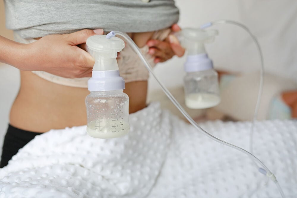 A woman pumping breast milk A woman pumping breast milk