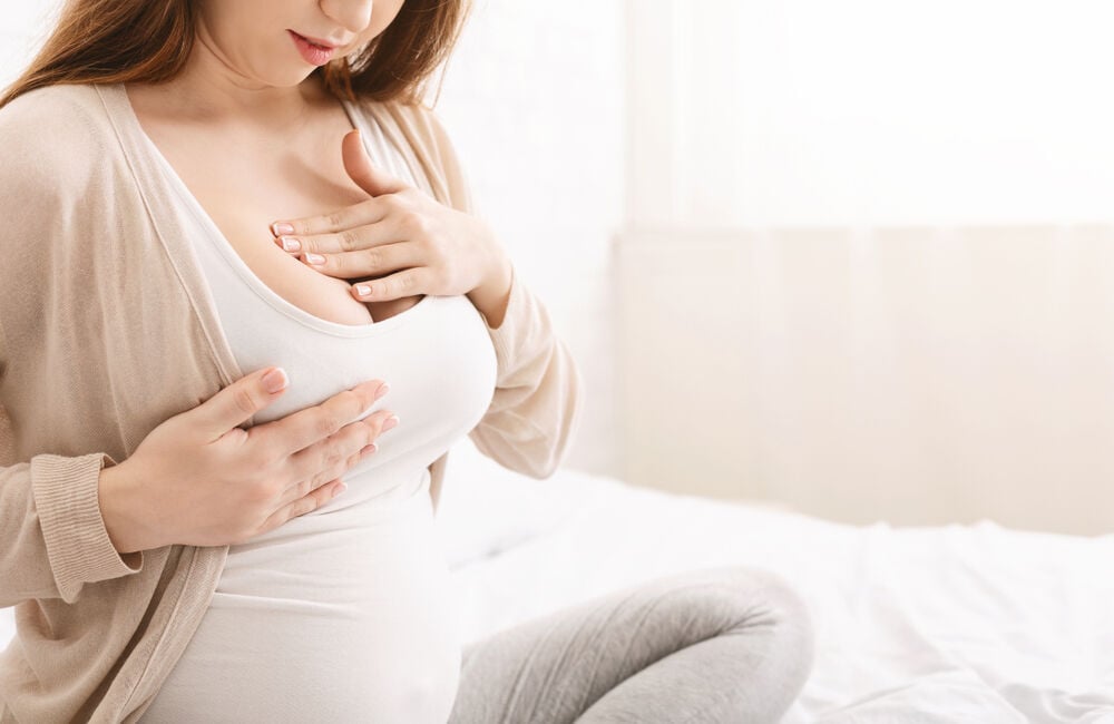 A woman with breast changes during pregnancy A woman with breast changes during pregnancy