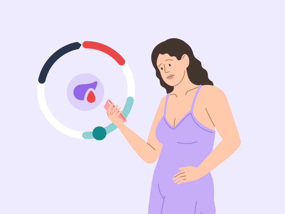 Single image woman looking at her period tracker wondering why she's bleeding between her periods