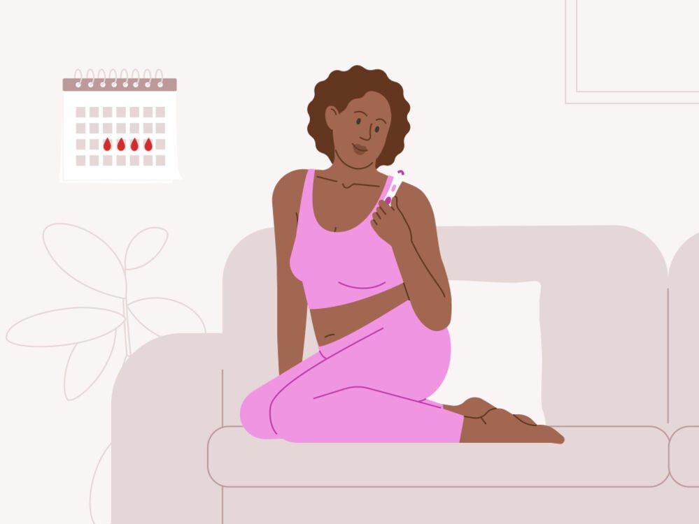 woman holding a pregnancy test trying to understand the result woman reading a pregnancy test result