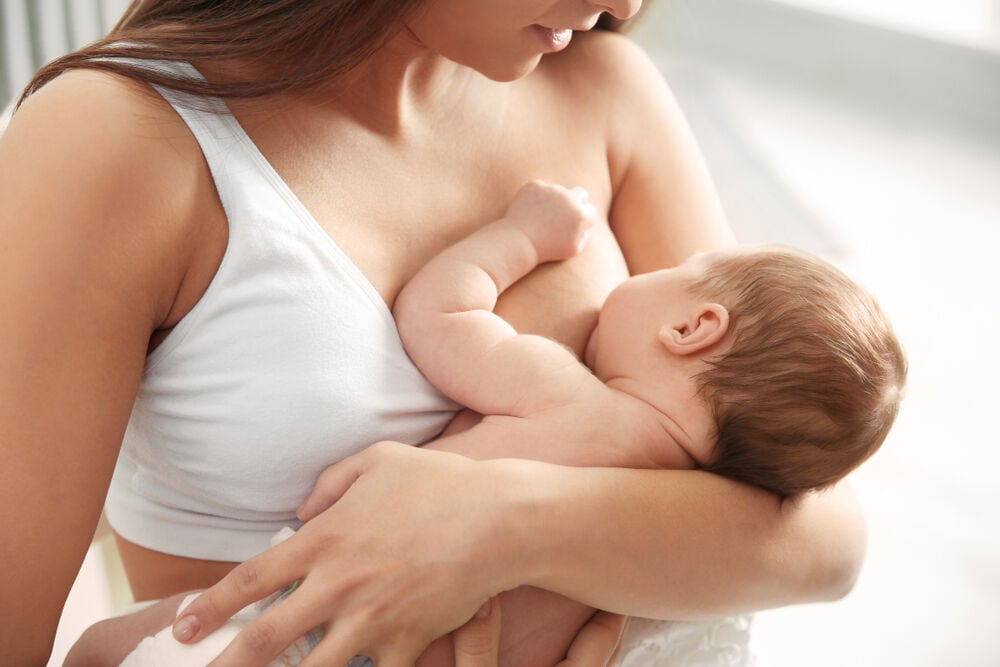 A baby biting while nursing A baby biting while nursing