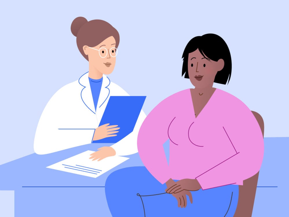 woman talking to a doctor  woman talking to a doctor