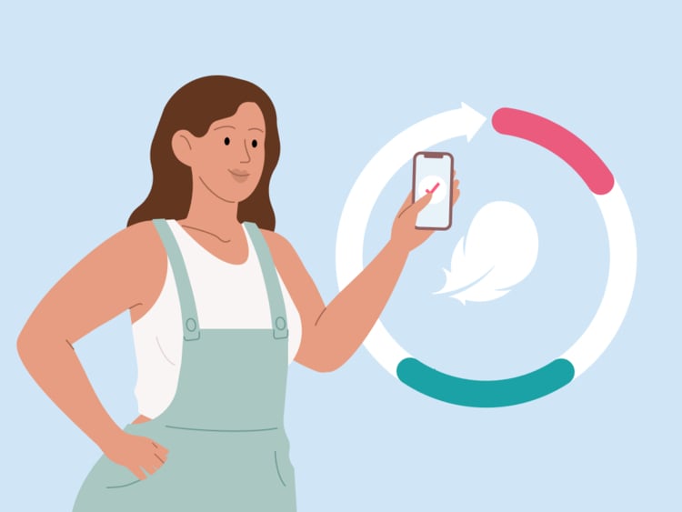 woman tracking her cycle using an app on her phone woman tracking her cycle using an app