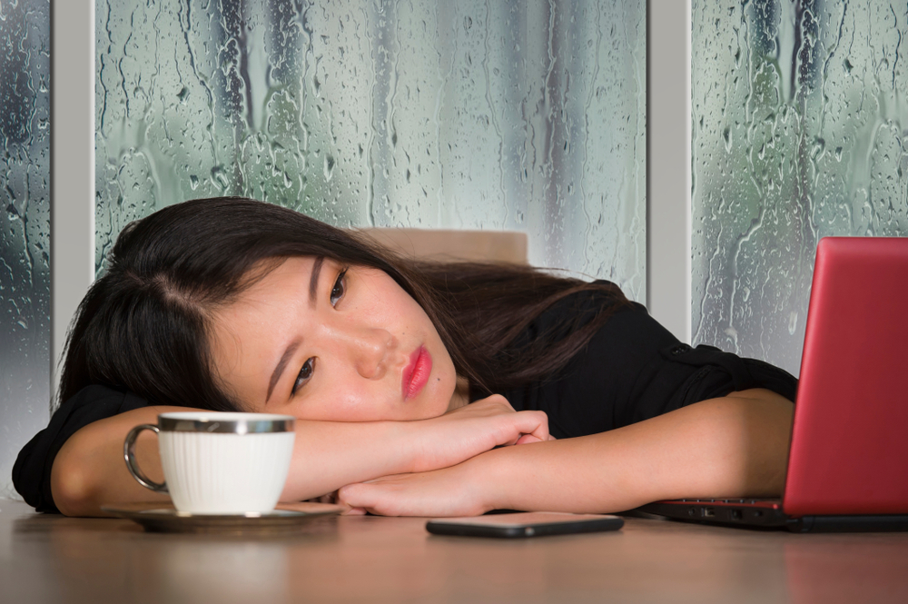 woman exhausted and frustrated at office woman exhausted and frustrated at office