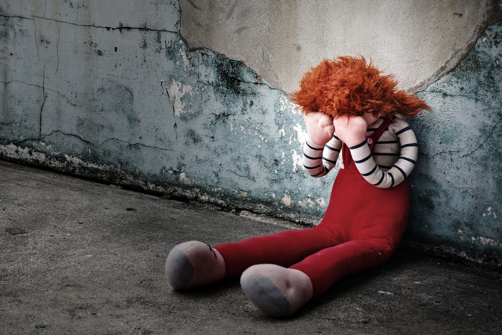 crying doll as a symbol of a neglected child crying doll as a symbol of a neglected child