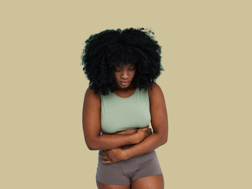 Woman having period cramps Woman having period cramps