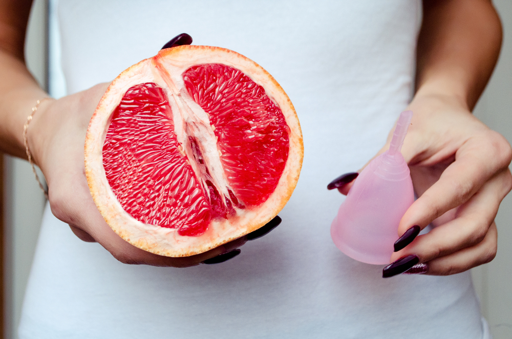 Masturbating with a menstrual cup inside depicted with the image of grapefruit