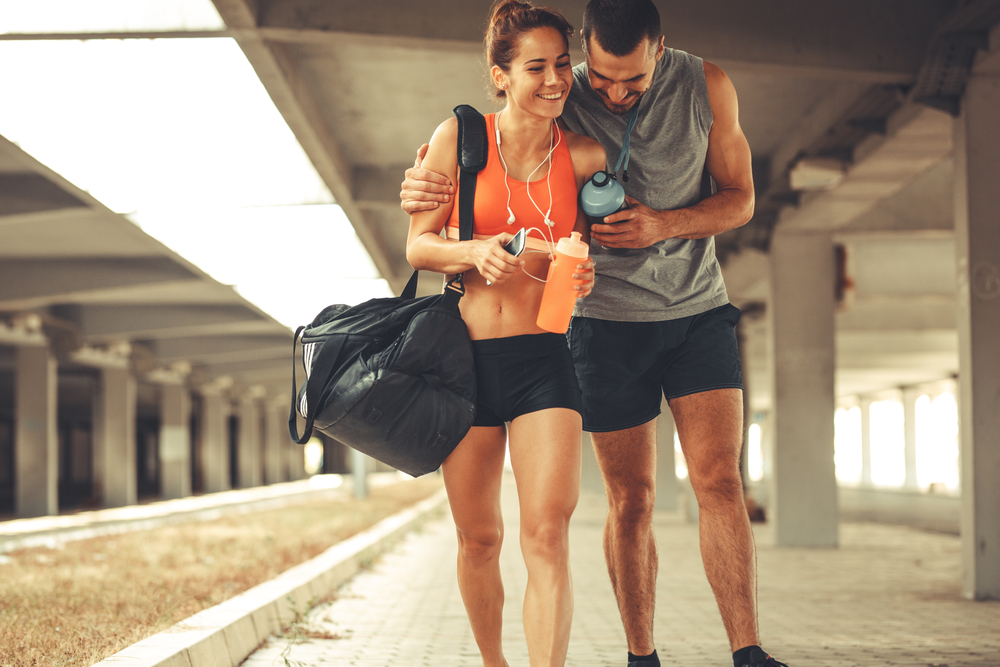 Healthy TTC Lifestyle Couple walking at the train station Healthy TTC Lifestyle Couple walking at the train station