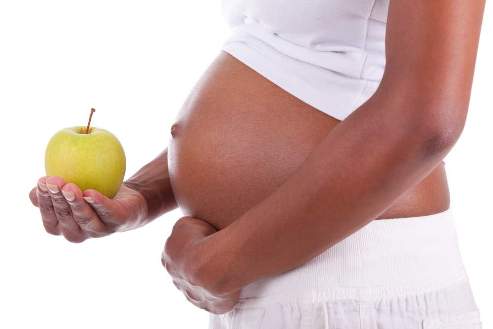 A woman eating healthy during pregnancy A woman eating healthy during pregnancy