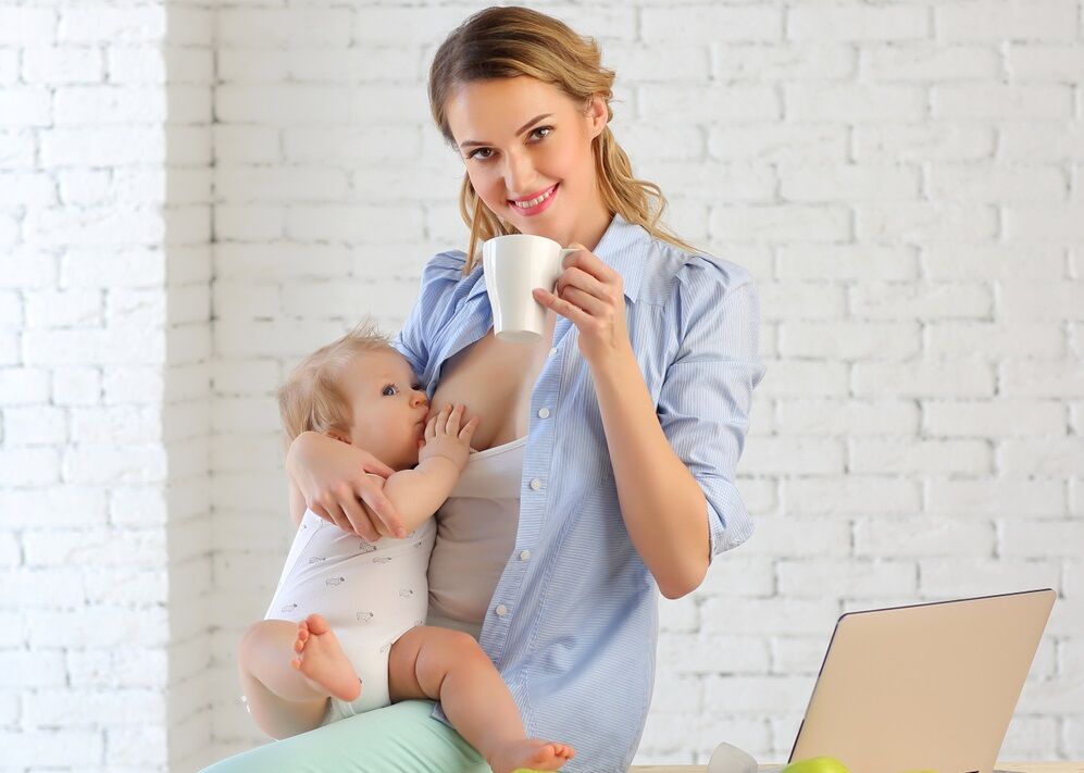 A woman drinking tea for nursing mothers