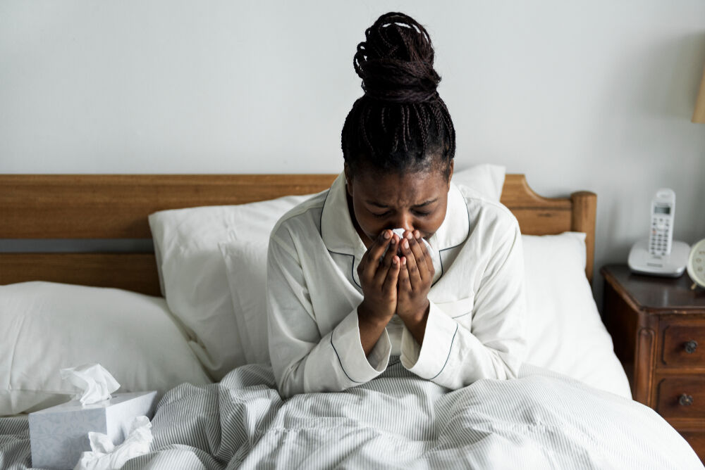 woman is sneezing 