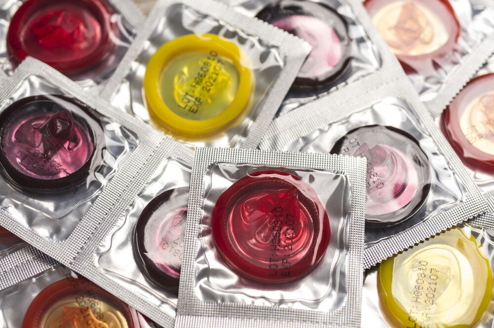 Multicolored condoms for first time sex