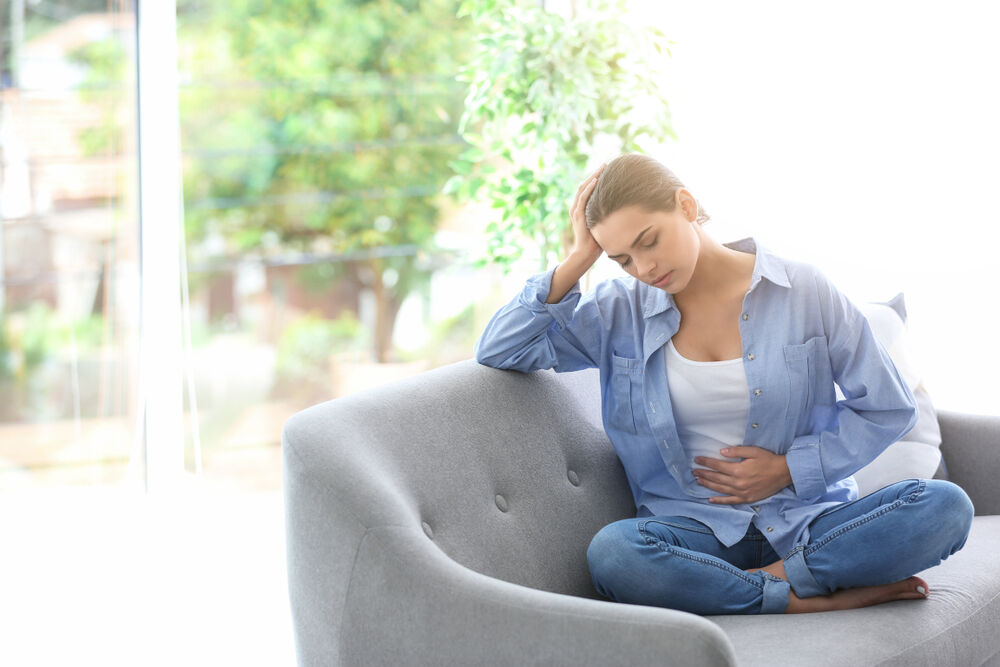 A woman having ovarian pain