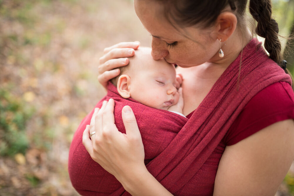 A wrap baby carrier 