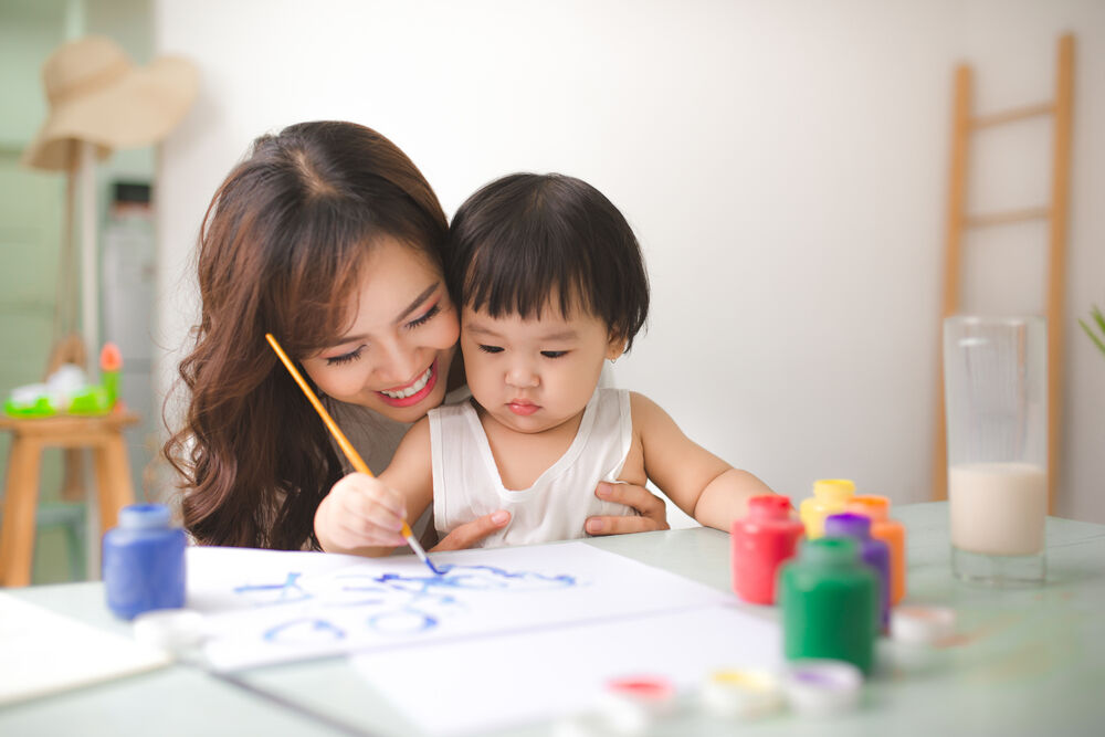 Water coloring - one of the things to do with an 11-month-old baby