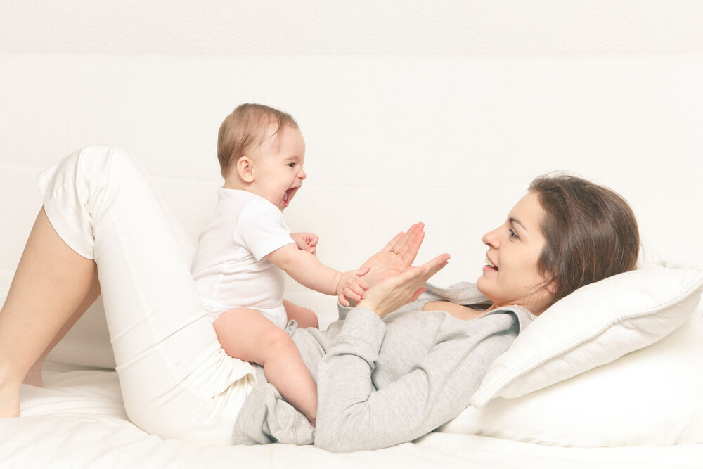 Clapping - one of the activities to do with a 6-month-old