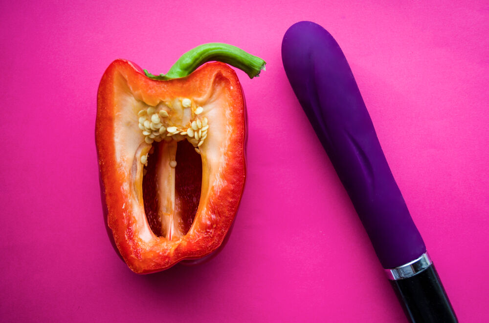 Menstruation masturbation depicted metaforically by a sex toy and a pepper