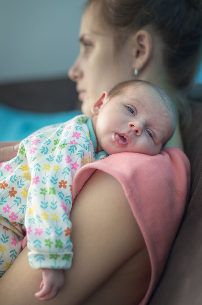 how to define first symptoms of postpartum depression