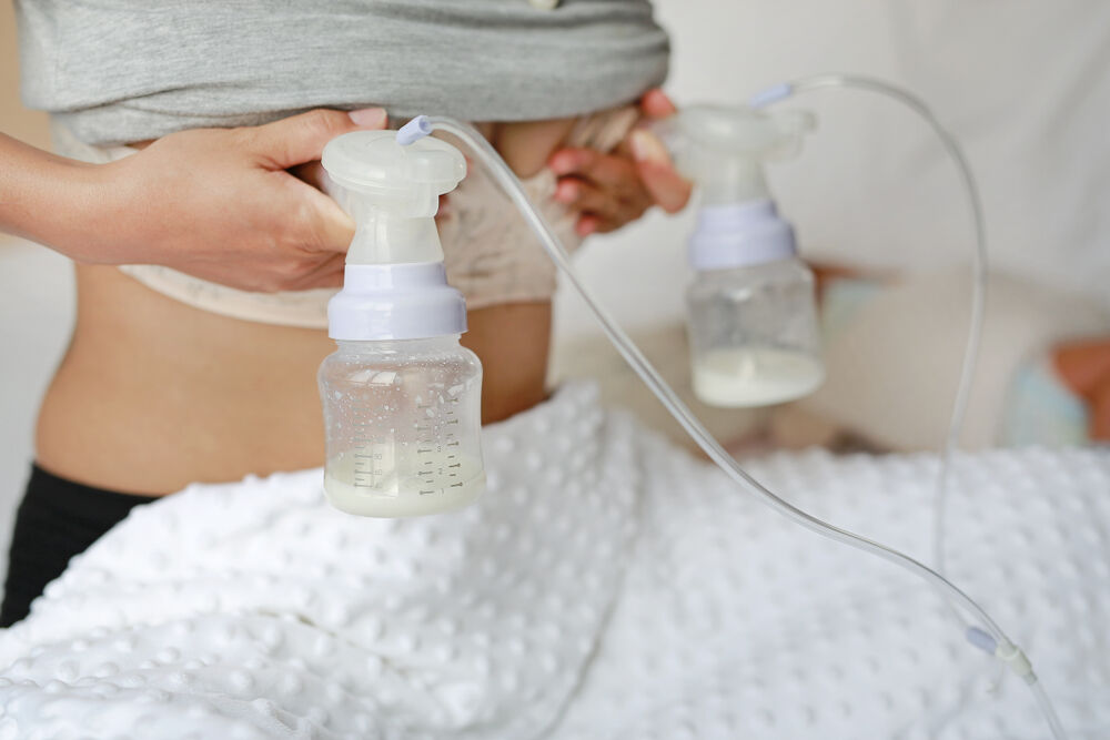 A woman pumping breast milk