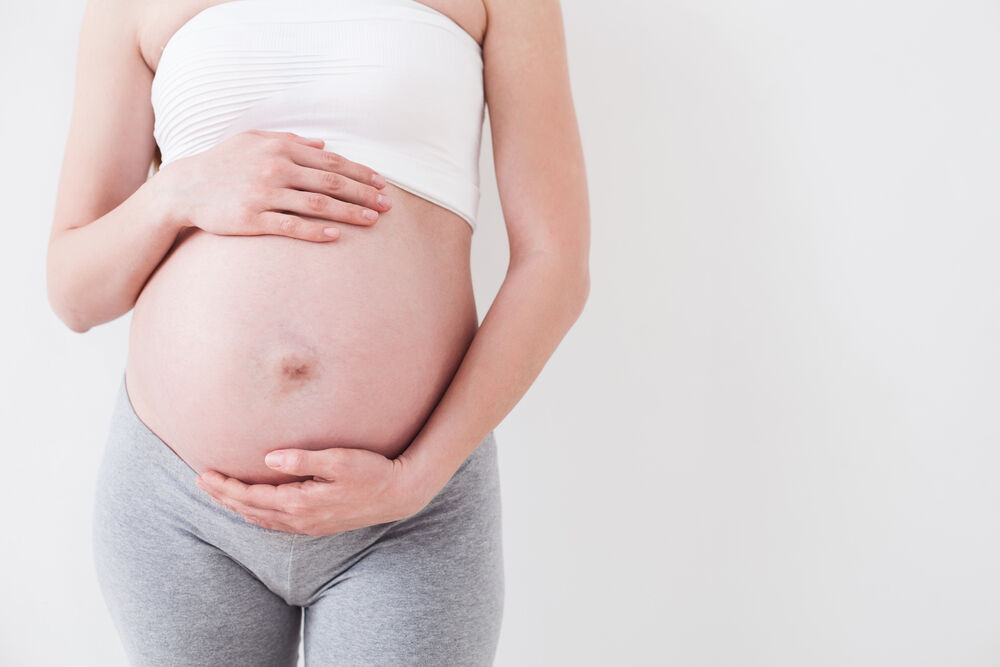 A woman having a large vaginal concentration of ureaplasma bacteria during pregnancy