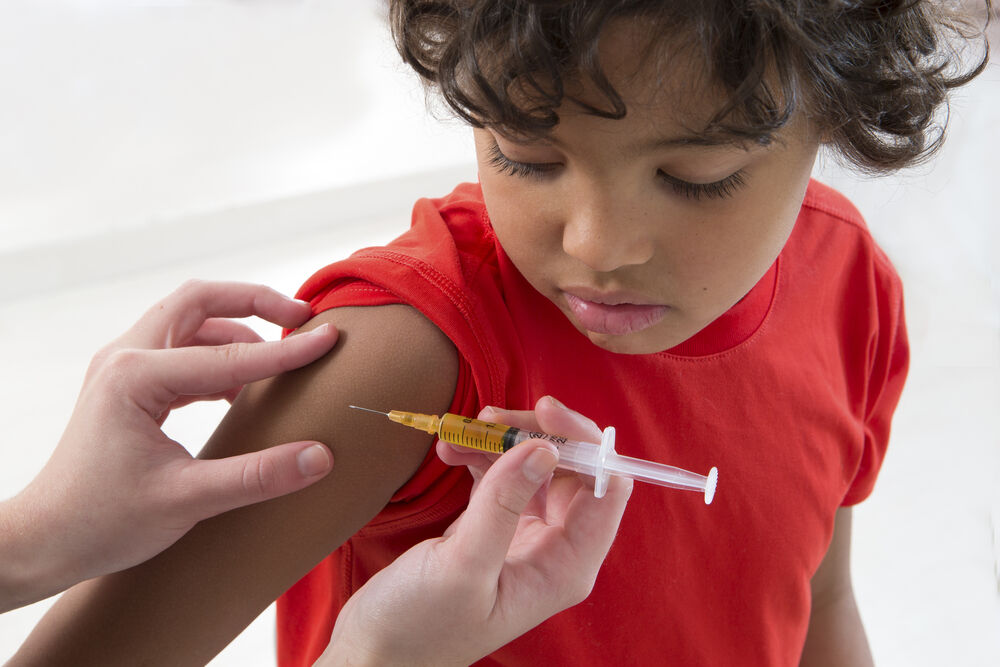 A child getting a dose of polio vaccine