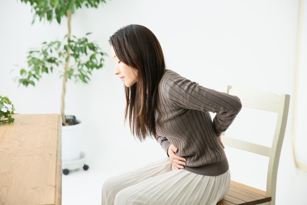 Lower back pain in the first weeks of pregnancy