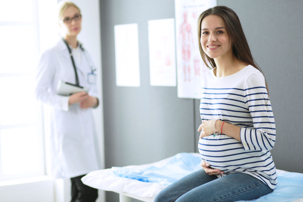 A pregnant woman getting ready to undergo the group B strep test