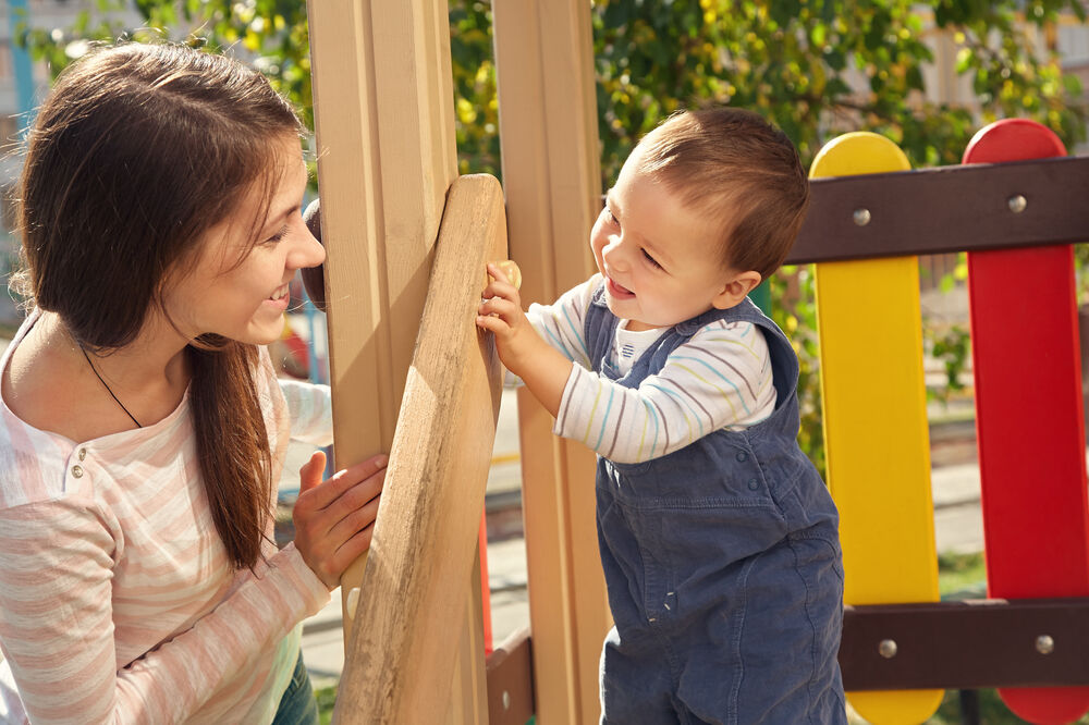 Peek-a-boo - one of the games to play with a 9-month-old