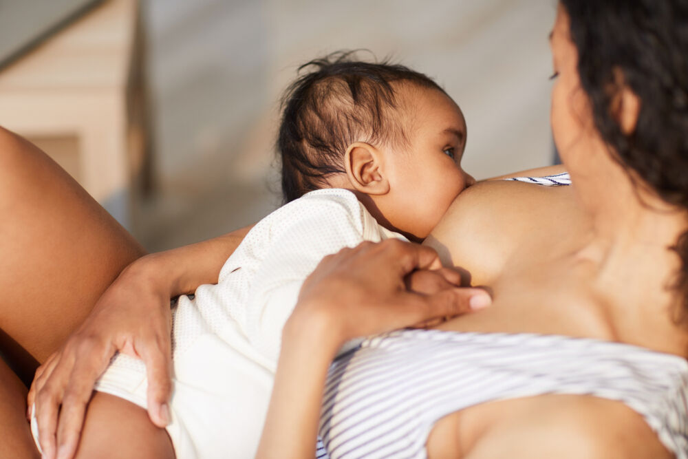 A woman trying to prevent mastitis