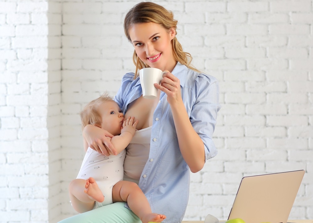 A woman drinking tea for nursing mothers A woman drinking tea for nursing mothers