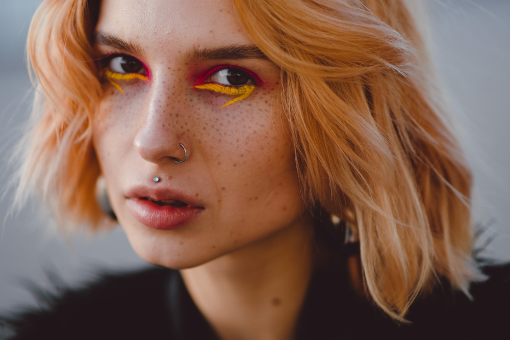 woman with different types of piercings woman with different types of piercings