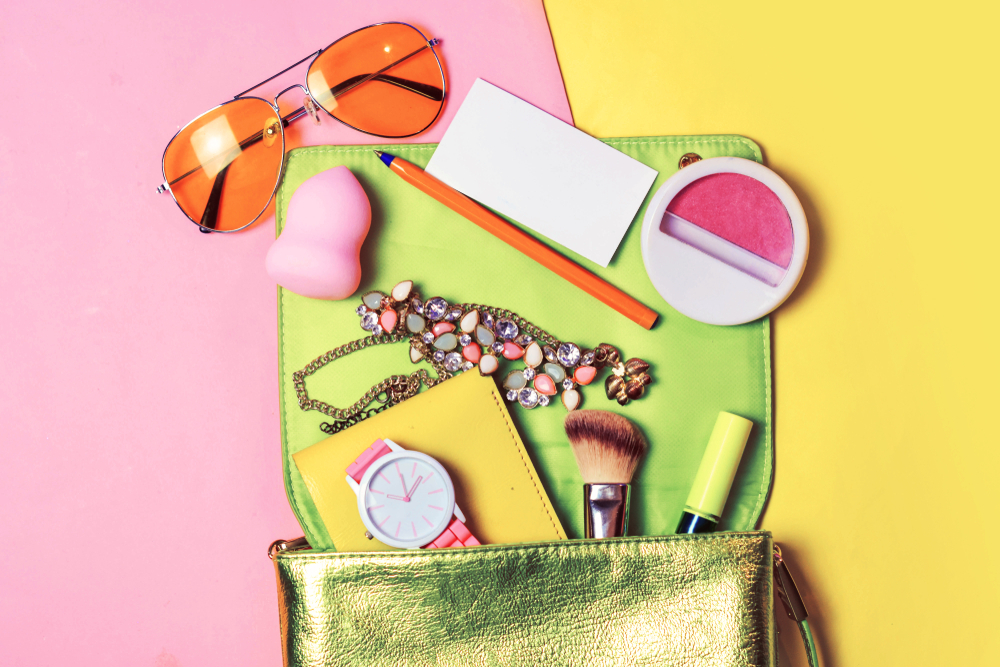Make up accessories in a girl's bag Make up accessories in a girl's bag