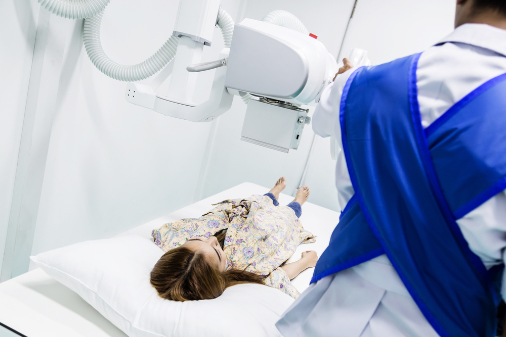 woman patient undergoing scan at hospital woman patient undergoing scan at hospital