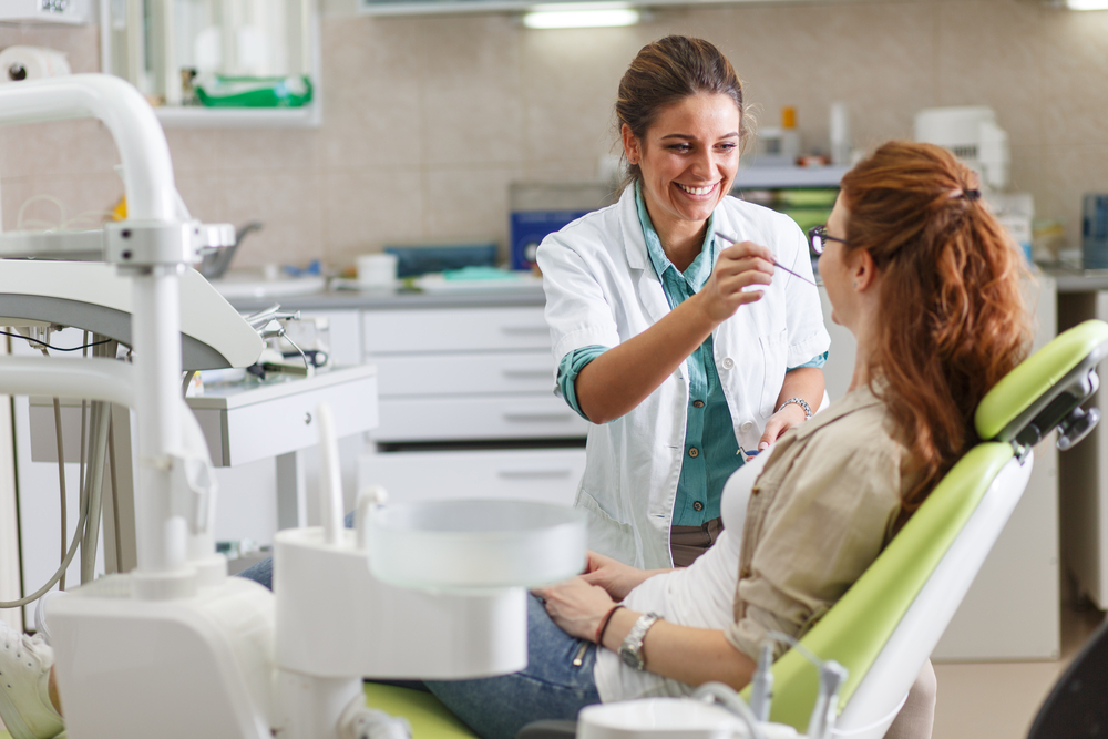 A woman at a dentist visit A woman at a dentist visit