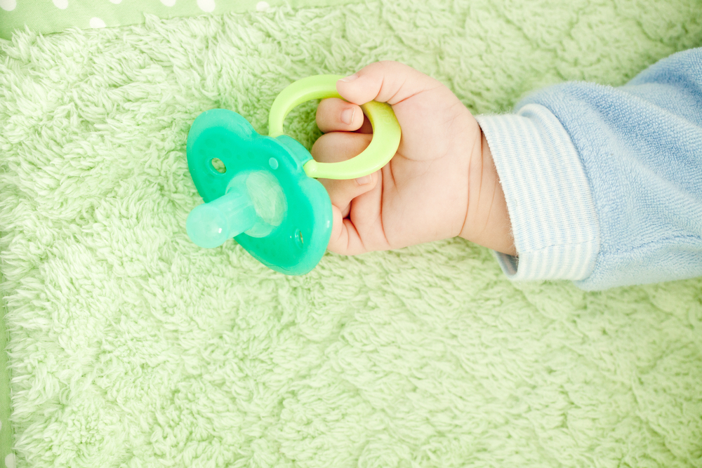 A baby pacifier A baby pacifier