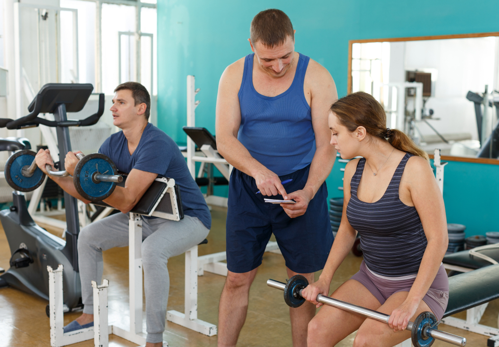 man and woman practicing in the gym man and woman practicing in the gym