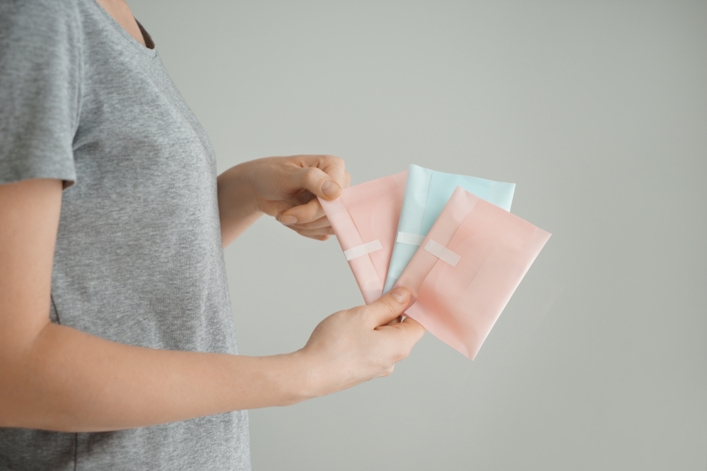 woman holding pads woman holding pads