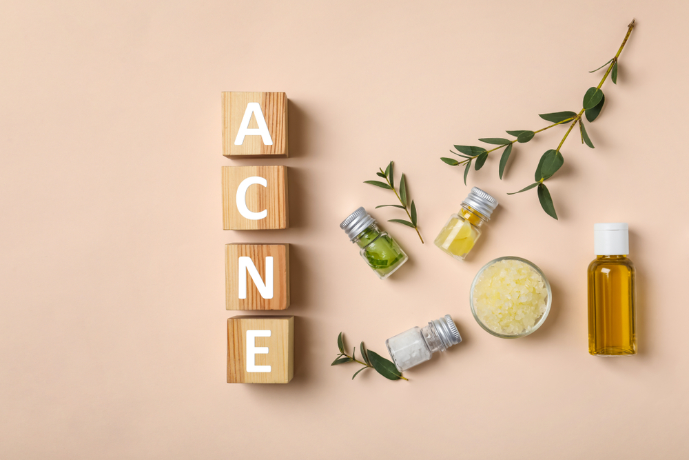 Cubes with word "Acne" and ingredients for homemade problem skin remedy Cubes with word "Acne" and ingredients for homemade problem skin remedy