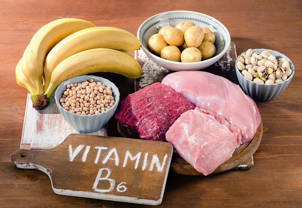 Foods Highest in Vitamin B6 on wooden board. Foods Highest in Vitamin B6 on wooden board.