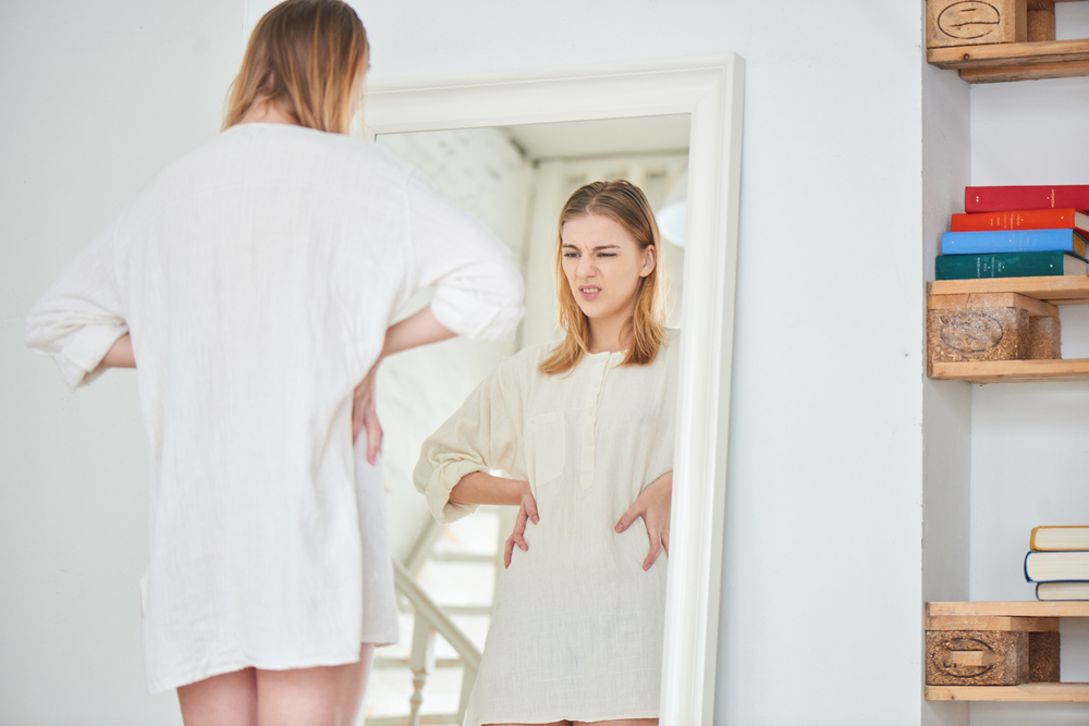 A woman wih body image disorder A woman wih body image disorder