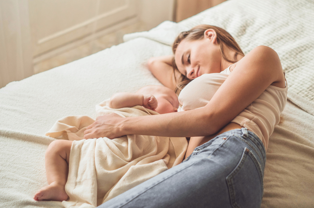 A mom breastfeeding while sick A mom breastfeeding while sick