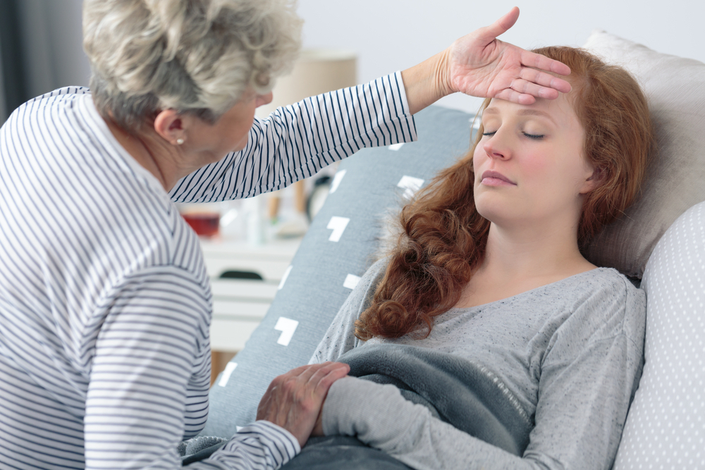 A young woman suffering from toxiс shock syndrome A young woman suffering from toxiс shock syndrome