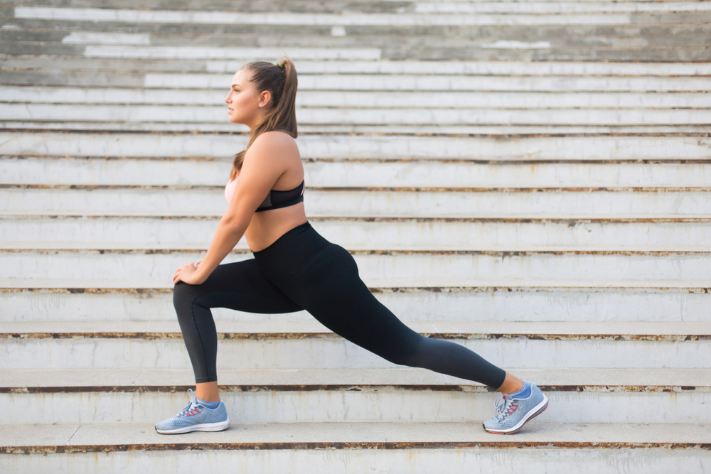 A woman stretching to prevent shin splints A woman stretching to prevent shin splints
